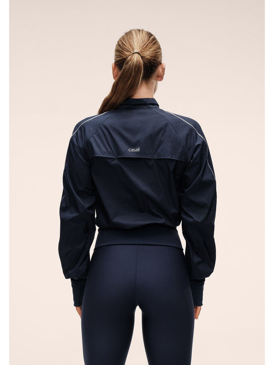 Kurtka damska CASALL Statement Woven Training Jacket granatowa
Kurtka damska CASALL Statement Woven Training Jacket granatowa