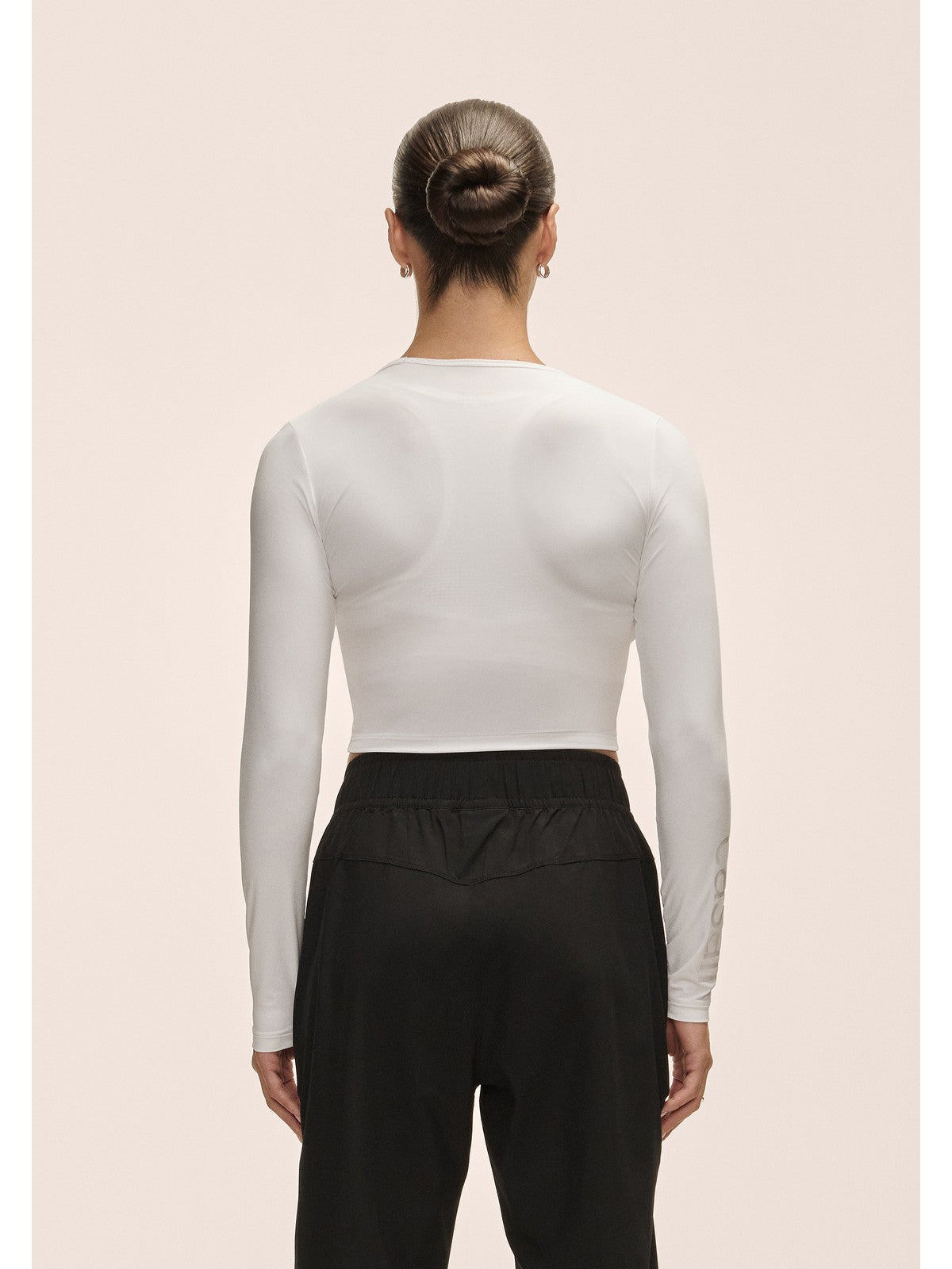 Koszulka damska treningowa Casall Graphic Crop Long Sleeve biały - Adventure Sports
