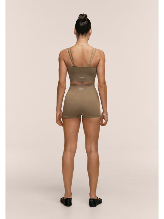 Legginsy treningowe damskie CASALL Shiny Seamless Rib Hotpants kolor zielony
