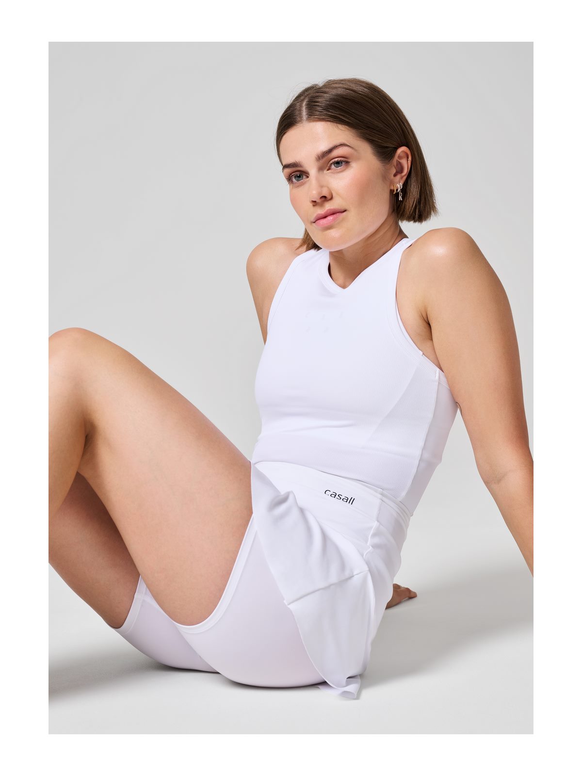 Koszulka sportowa CASALL Defined Rib Racerback biały - Adventure Sports