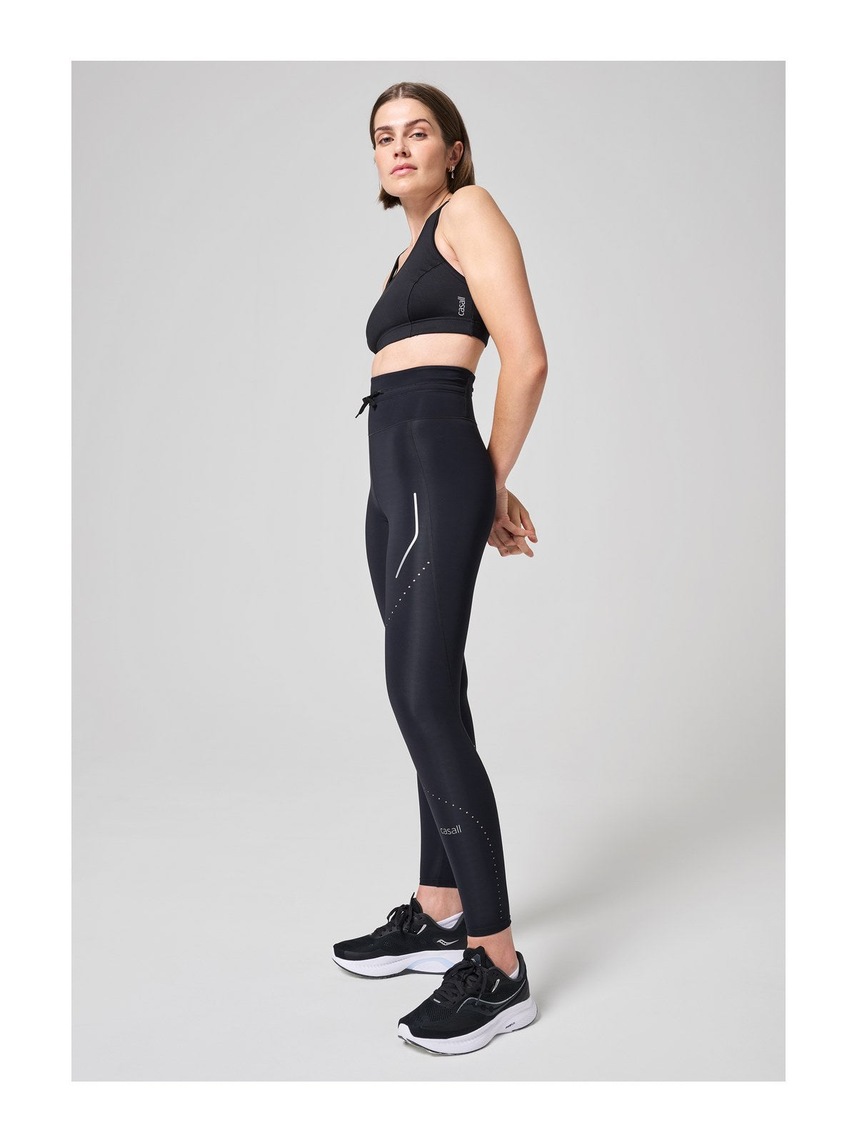 Legginsy treningowe z wysokim stanem CASALL Shapify High Waist Running Tights black - Adventure Sports
