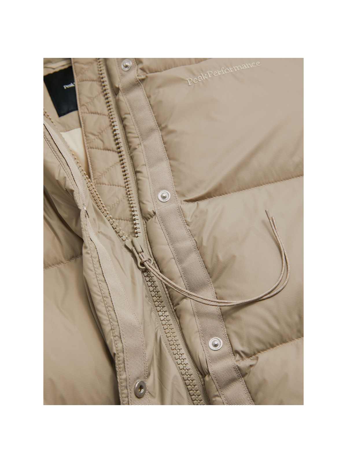 Kurtka puchowa Peak Performance W Down Puffer beżowy - narciarska - Adventure Sports