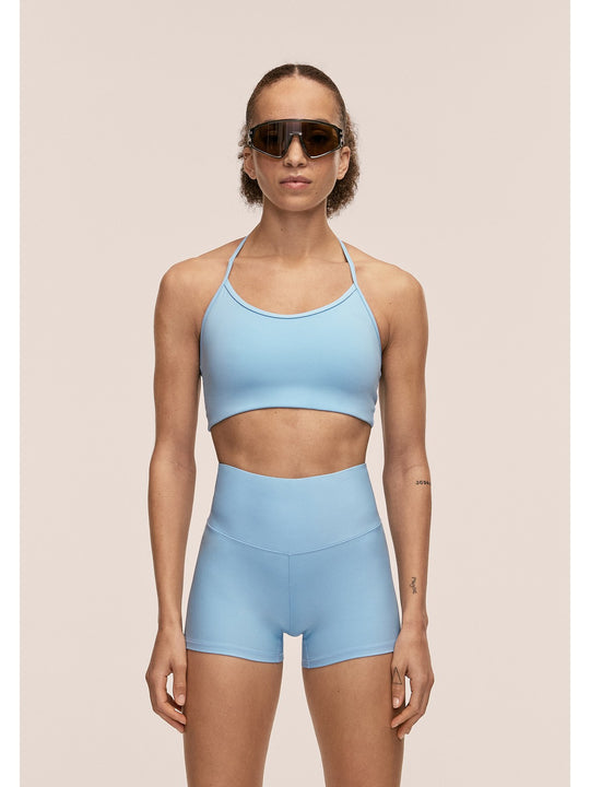 Stanik sportowy CASALL Sleek Strappy Sports Bra kolor niebieski
