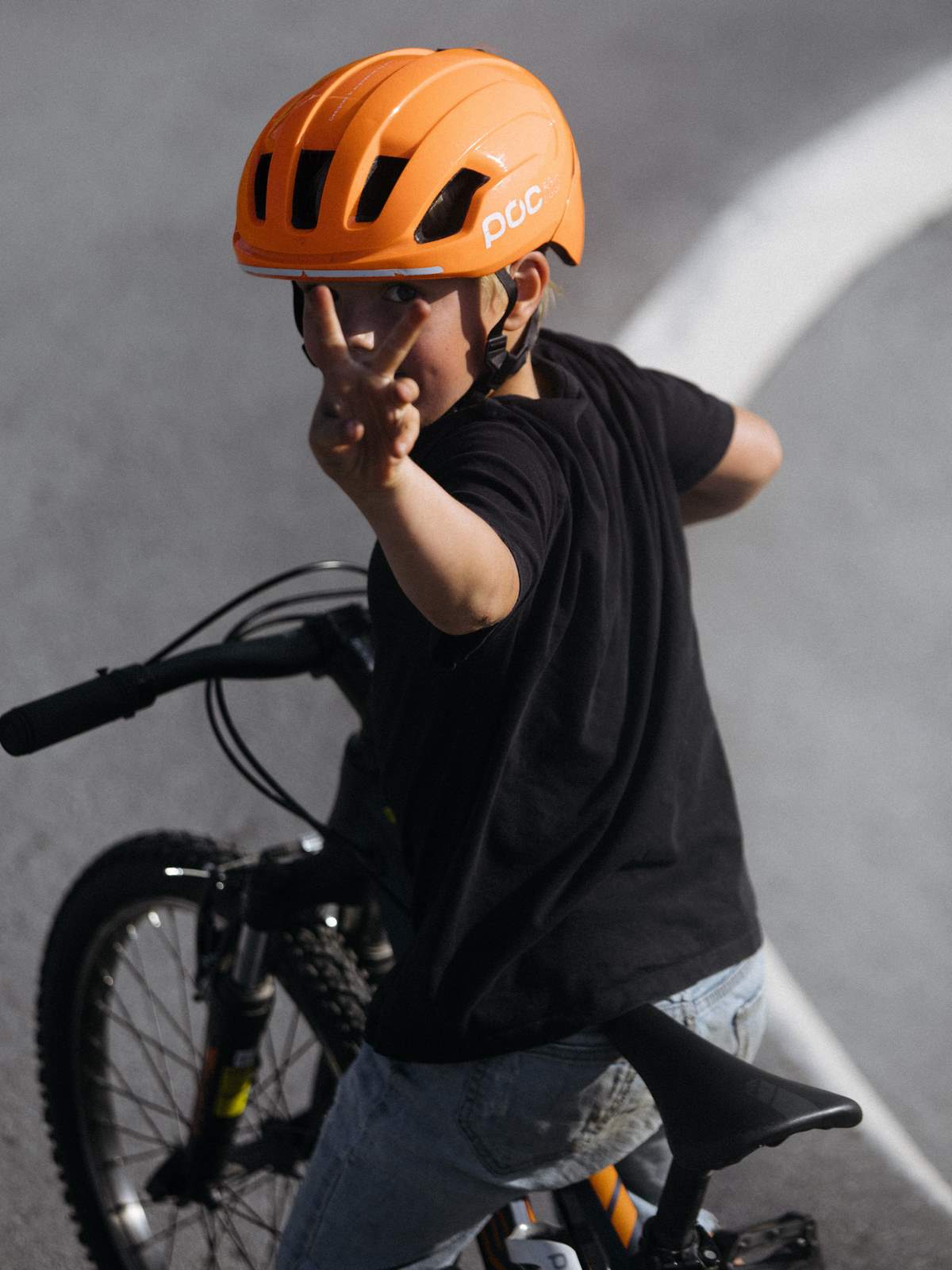 Kask rowerowy POCito OMNE MIPS - pomarańczowy