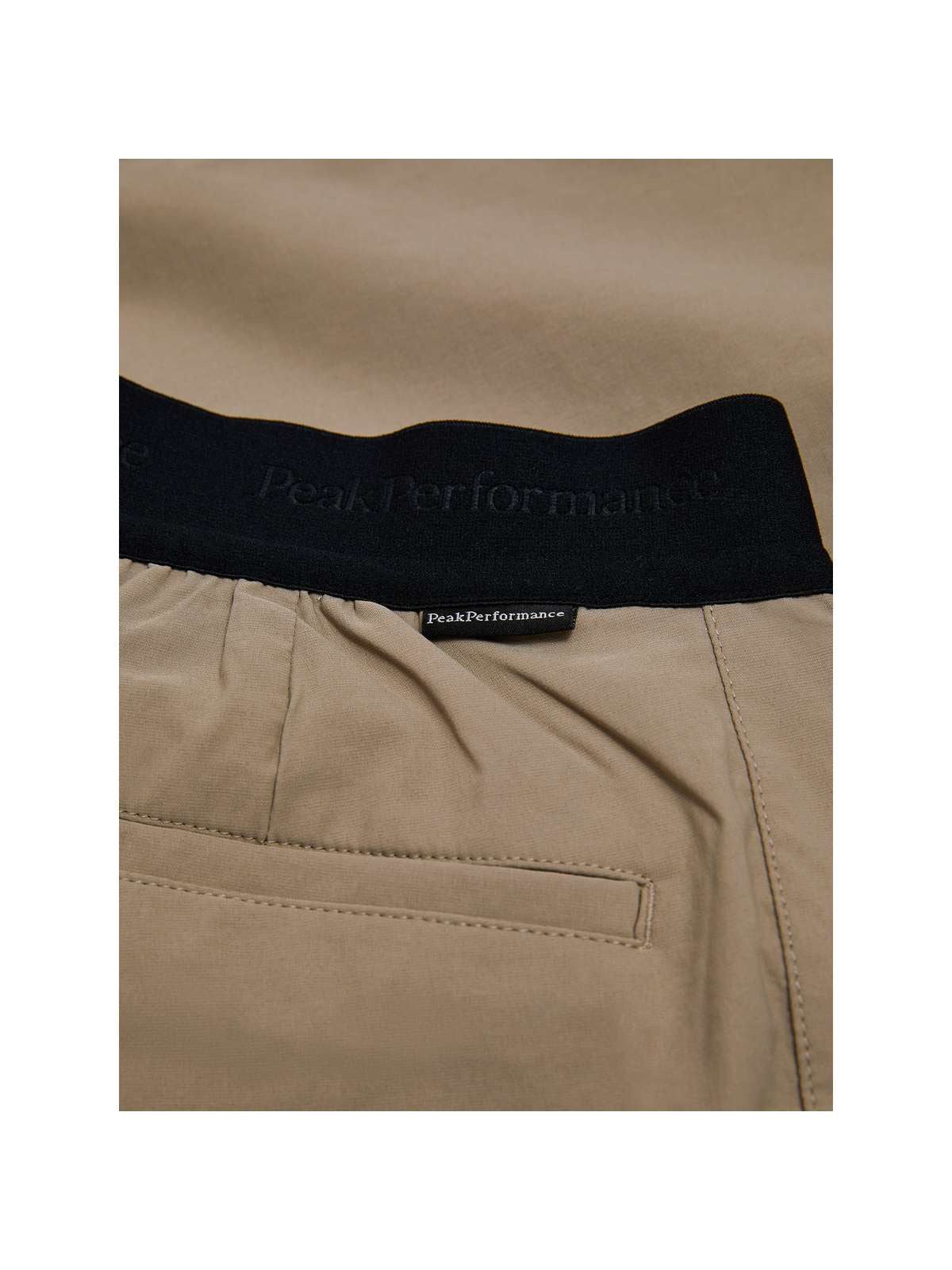 Szorty PEAK PERFORMANCE W Player Shorts beżowy - Adventure Sports