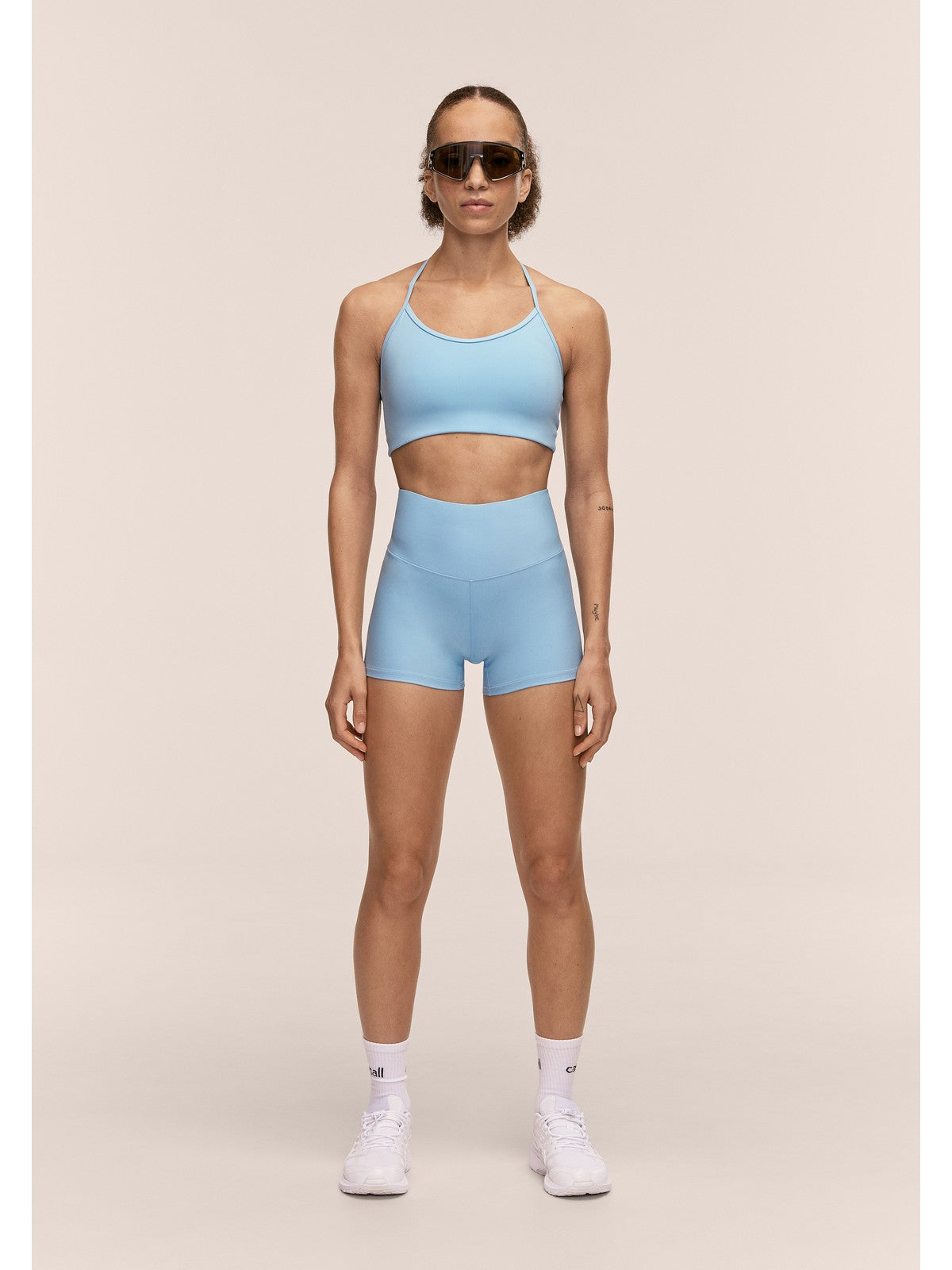 Stanik sportowy CASALL Sleek Strappy Sports Bra kolor niebieski
