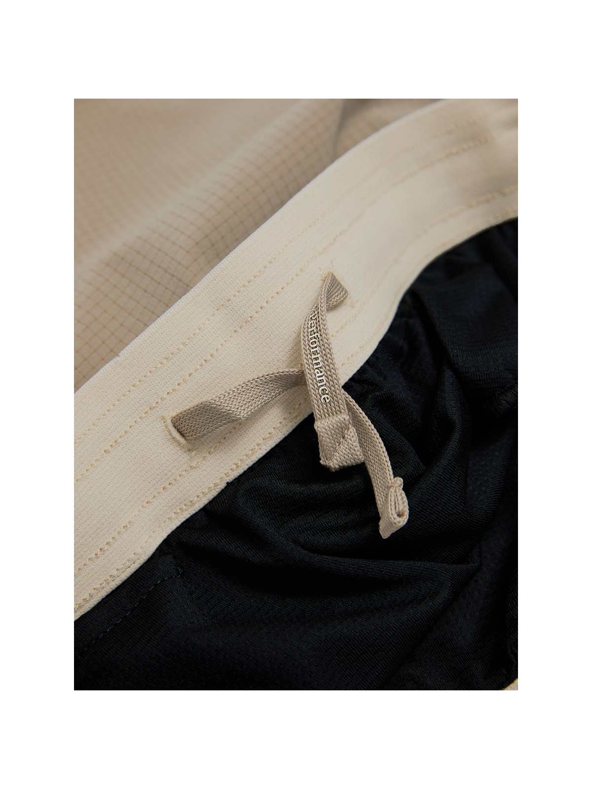 Szorty treningowe damskie PEAK PERFORMANCE W Trail Light Shorts beżowe - Adventure Sports