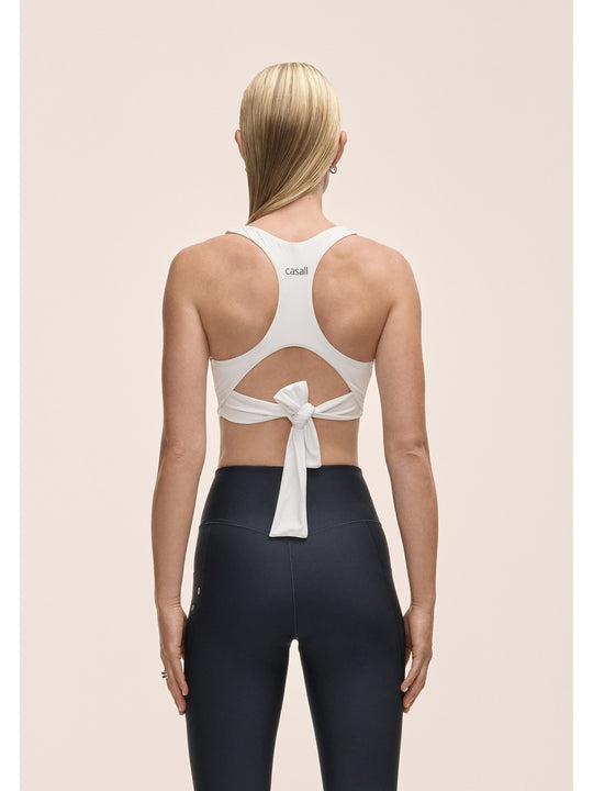 Top damski treningowy Casall Tie Back Sports biały - Adventure
