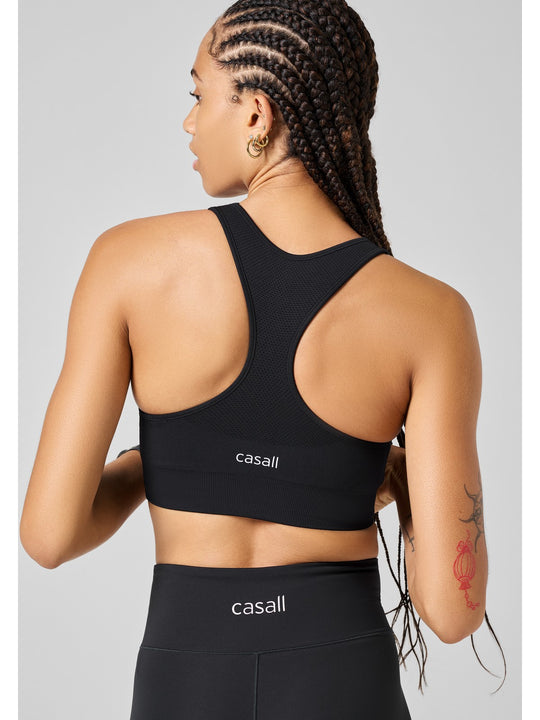 Top treningowy CASALL Seamless Soft Sports Bra czarny - Adventure
