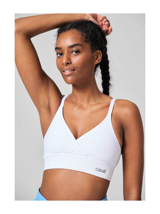 Stanik treningowy CASALL Wrap Sports Bra biały
