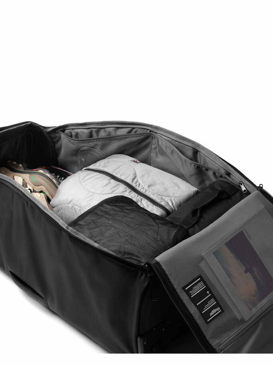 Torba podróżna na kółkach Db™ Hugger Roller Bag Check-In 90L niebieski
