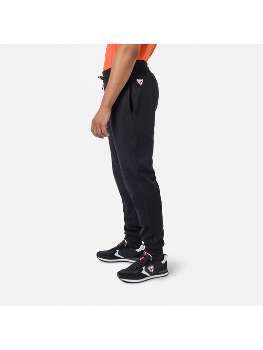 Spodnie dresowe męskie Rossignol LOGO PANT FL czarny - Adventure Sports
