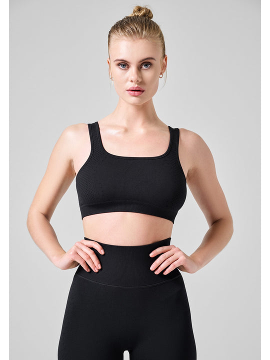 Top damski treningowy CASALL Scallop Seamless Bralette czarny - Adventure Sports
