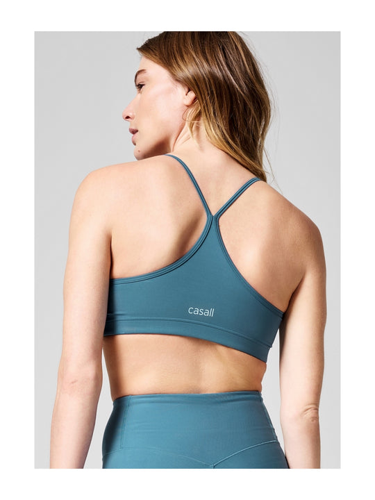 Stanik treningowy CASALL Strappy Sports Bra niebieski - Bielizna - Adventure
