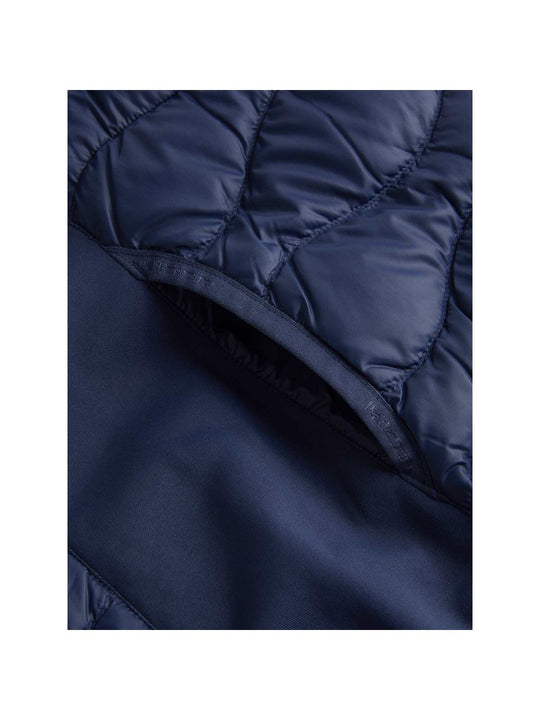 Kurtka puchowa Peak Performance W Helium Down Hybrid Hood niebieski - Adventure Sports
