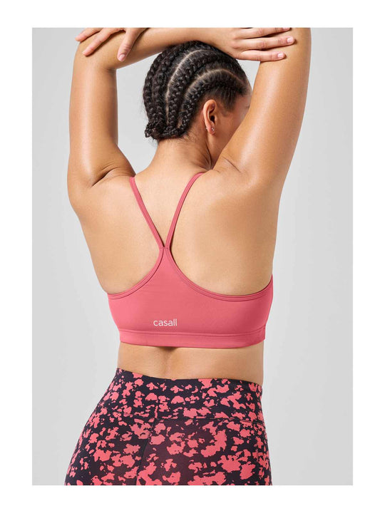 Stanik treningowy CASALL Strappy Sports Bra różowy - Top - Adventure
