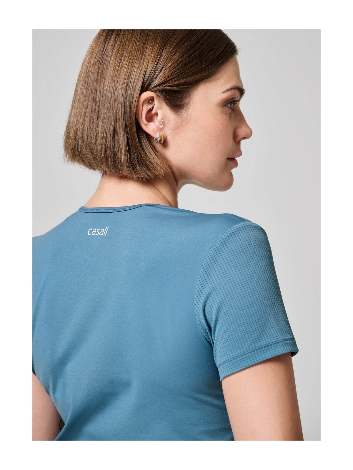 Koszulka CASALL Essential Mesh Detail Tee niebieski - Adventure Sports