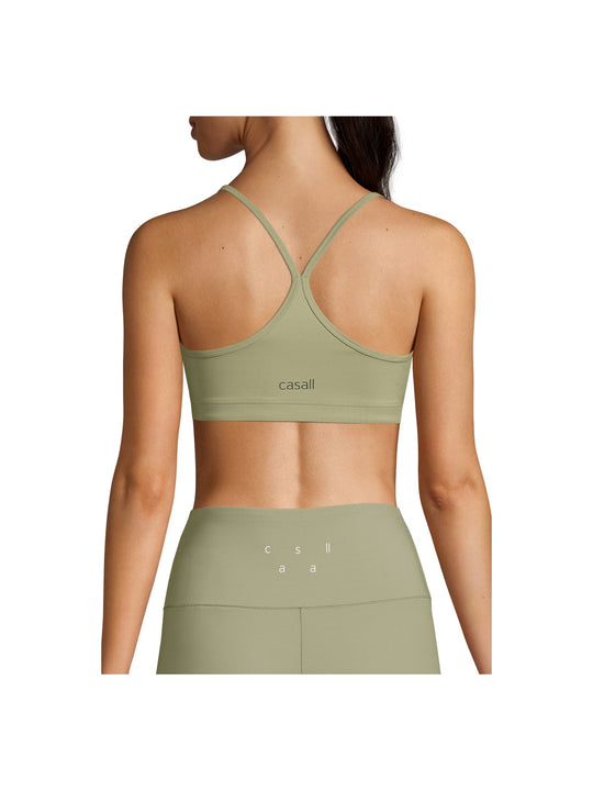 Stanik treningowy CASALL Strappy Sports Bra zielony - Top - Adventure
