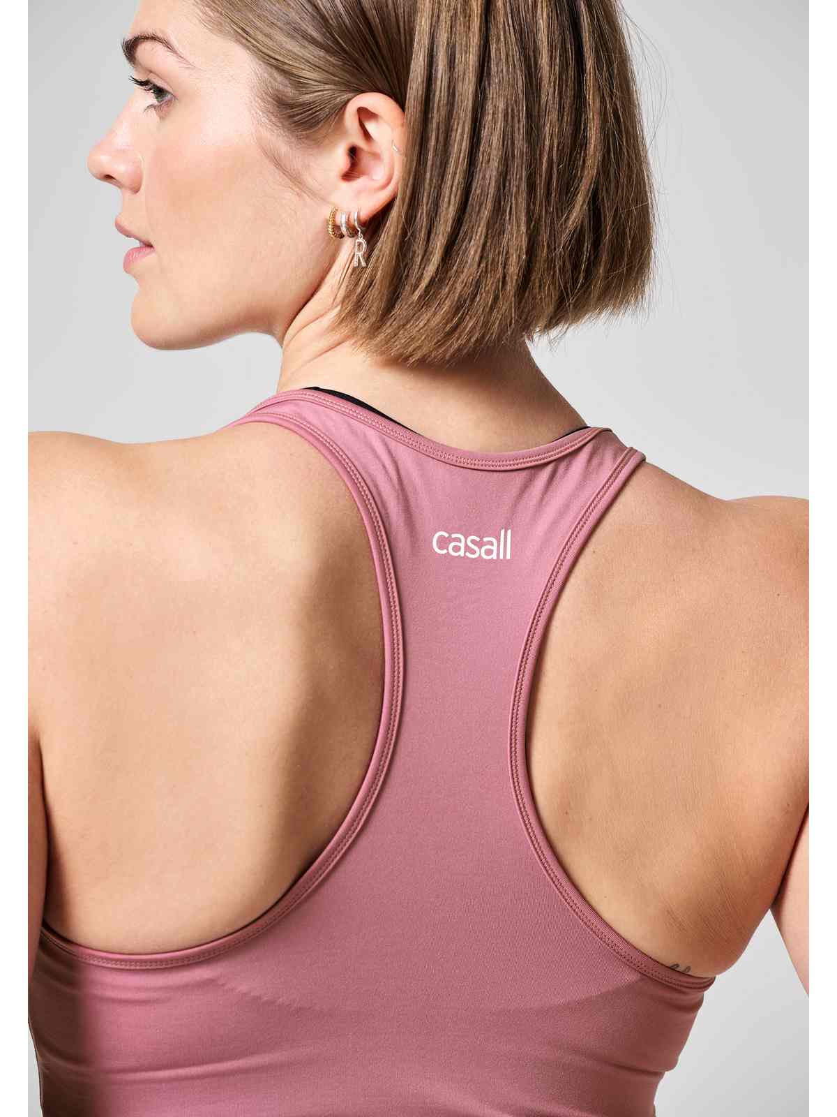 Koszulka sportowa CASALL Essential Racerback różowy - Adventure Sports